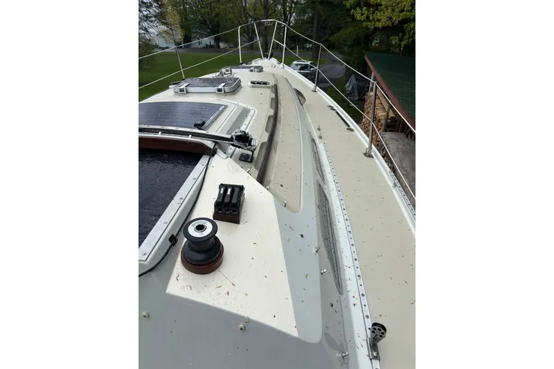Slide: The Image of 1987 Ericson 28/2 sailboat deck with winch and rigging details. - 14