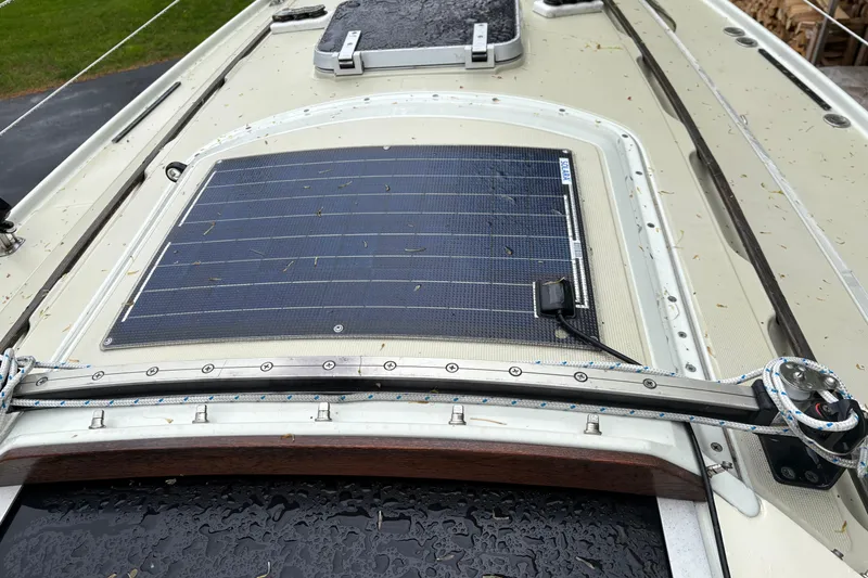 Slide: The Image of 1987 Ericson 28/2 sailboat with solar panel installed on deck. - 15