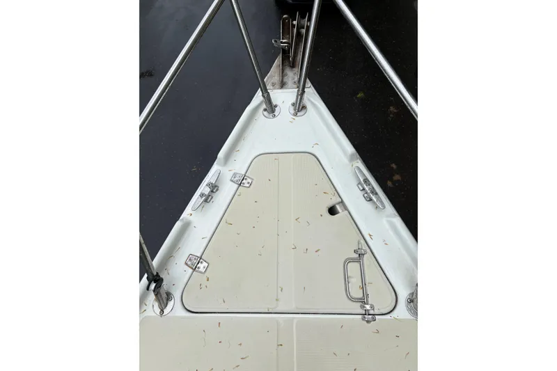 Slide: The Image of Bow of 1987 Ericson 28/2 sailboat with anchor locker and stainless steel fittings. - 16