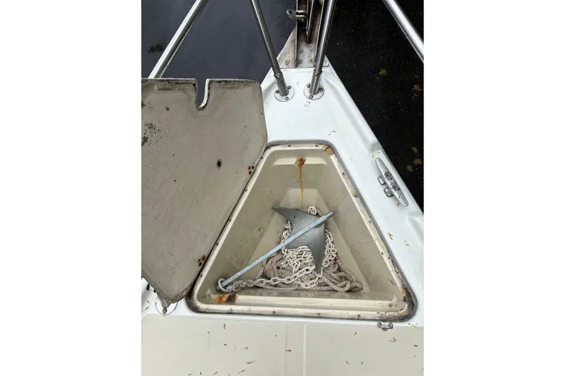 Slide: The Image of Anchor locker of 1987 Ericson 28/2 sailboat with chain and rope. - 17