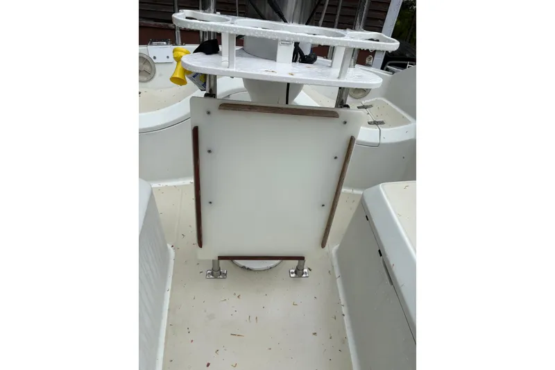 Slide: The Image of Cockpit of 1987 Ericson 28/2 sailboat with white deck and mounted equipment. - 23