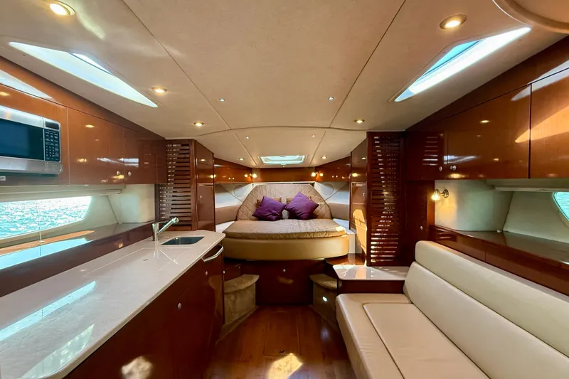 Slide: The Image of Luxurious interior of 2009 Sea Ray Sundancer 350 yacht with modern amenities and elegant design. - 11