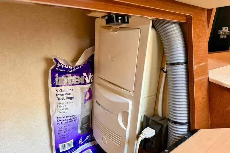 Slide: The Image of InterVac vacuum system with dust bags in a 2009 Sea Ray Sundancer 350 yacht. - 26