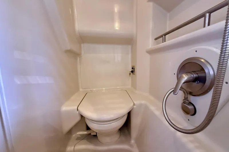 Slide: The Image of Compact bathroom in 2009 Sea Ray Sundancer 350 yacht with shower and toilet. - 49