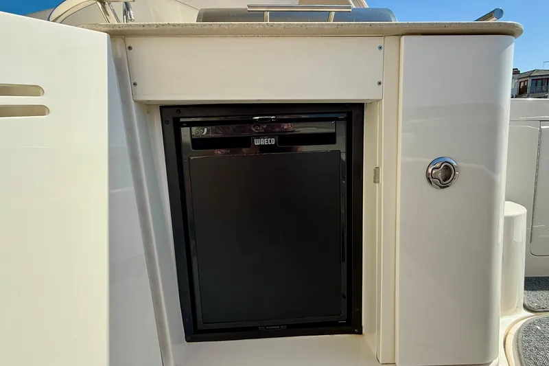 Slide: The Image of Compact fridge on 2009 Sea Ray Sundancer 350 yacht deck. - 57