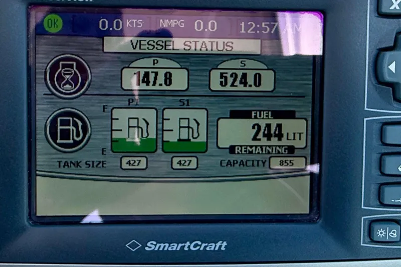 Slide: The Image of Display screen of a 2009 Sea Ray Sundancer 350 showing vessel status and fuel levels. - 70