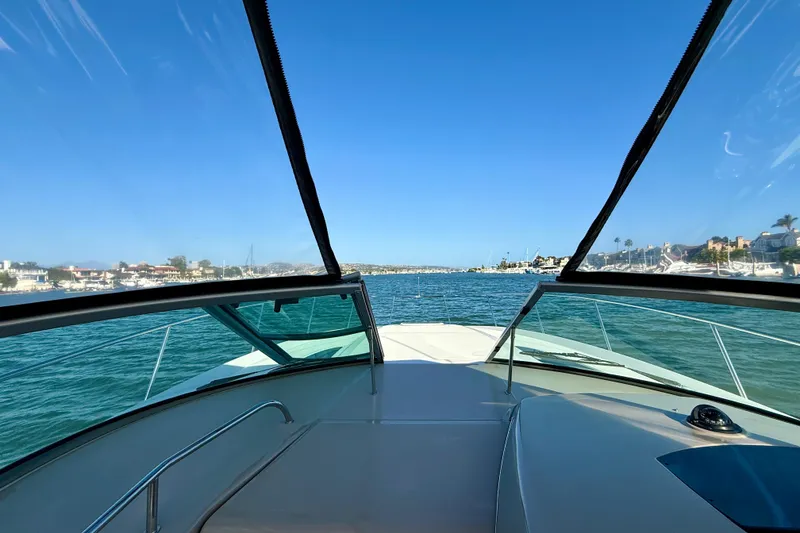 Slide: The Image of View from a 2009 Sea Ray Sundancer 350 yacht cruising on a sunny day. - 83