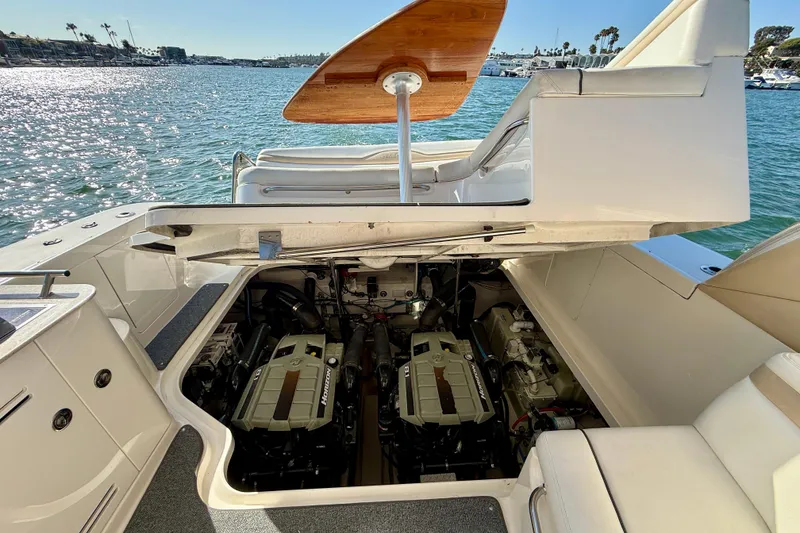 Slide: The Image of Engine compartment of a 2009 Sea Ray Sundancer 350 yacht, open on a sunny day. - 88