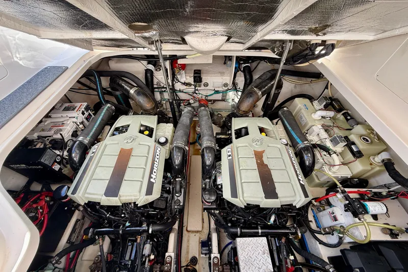 Slide: The Image of Engine compartment of a 2009 Sea Ray Sundancer 350 with twin Horizon engines. - 89