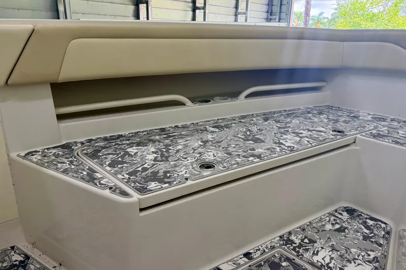 Slide: The Image of Interior view of a 2008 Jupiter 34 FS boat with patterned flooring. - 13