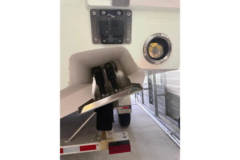 Slide: The Image of 2008 Jupiter 34 FS boat stern with trim tab and underwater light. - 37