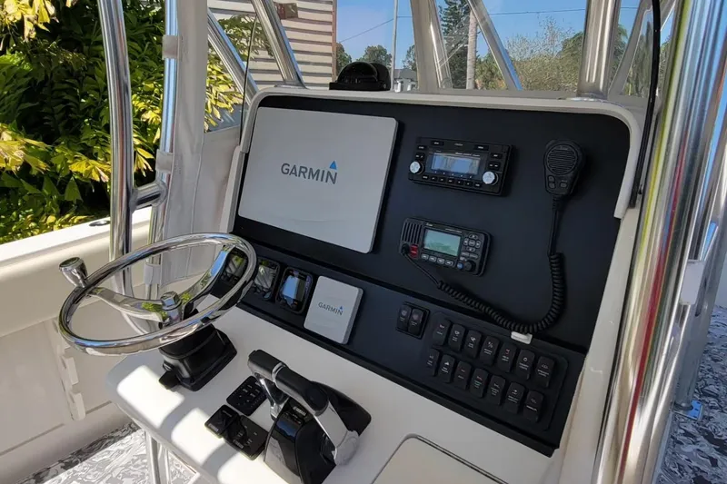 Slide: The Image of Control panel of a 2008 Jupiter 34 FS boat with Garmin navigation system. - 6