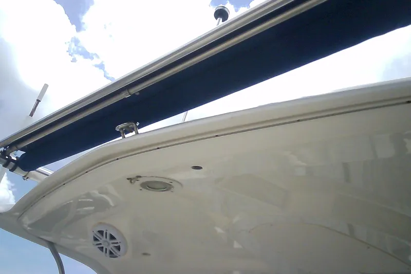 Slide: The Image of 2013 Chaparral 327 SSX boat with SureShade. - 11
