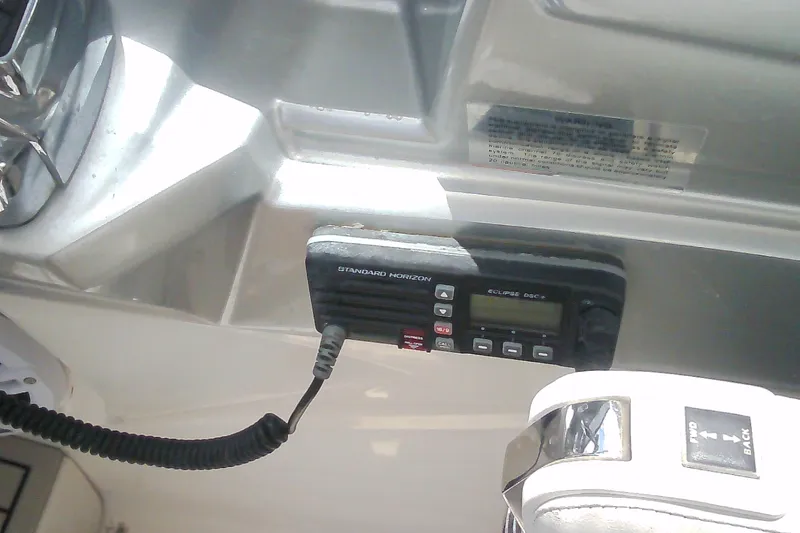 Slide: The Image of 2013 Chaparral 327 SSX boat dashboard with Standard Horizon Eclipse DSC+ radio. - 20