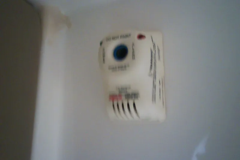 Slide: The Image of Carbon monoxide detector on a 2013 Chaparral 327 SSX boat interior wall. - 35