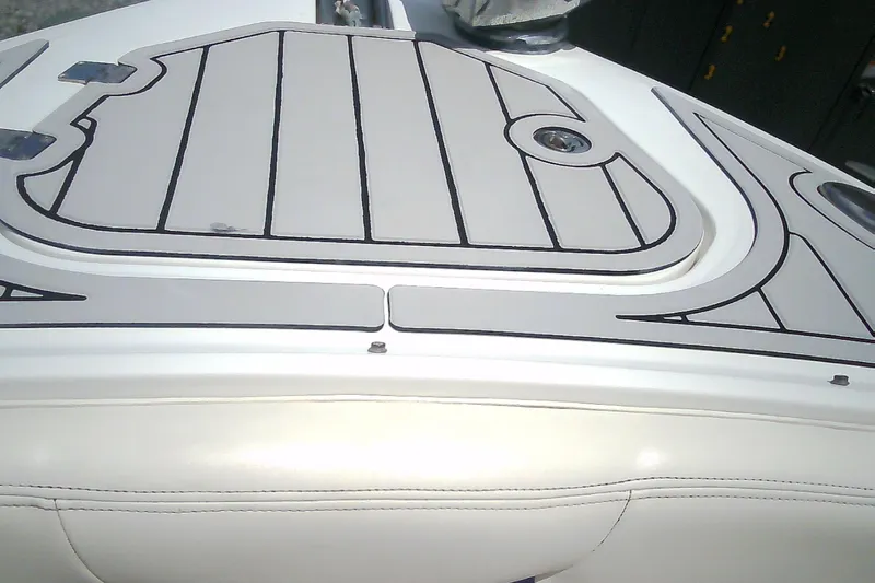 Slide: The Image of 2013 Chaparral 327 SSX boat deck with sleek, modern design and detailing. - 4