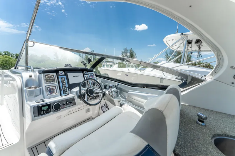 Slide: The Image of Cockpit view of 2013 Chaparral 327 SSX boat with modern controls and steering. - 51