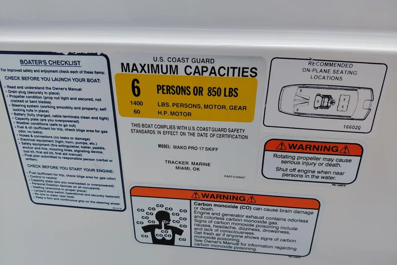 Slide: The Image of 2015 Mako Pro Skiff 17 CC capacity label, safety warnings, and boater's checklist. - 34