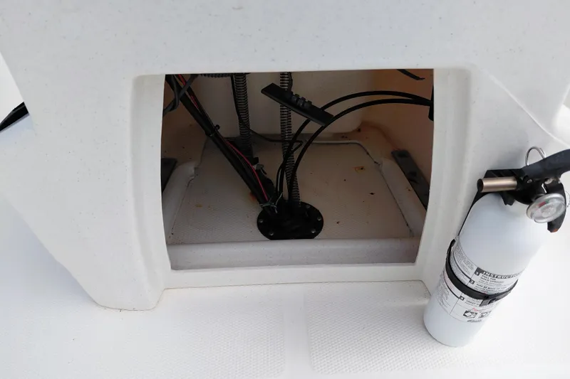 Slide: The Image of 2015 Mako Pro Skiff 17 CC interior wiring and fire extinguisher detail. - 35