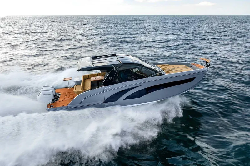 The Image of 2027 Hanover 387 boat cruising on open sea, showcasing sleek design and powerful performance. - 0