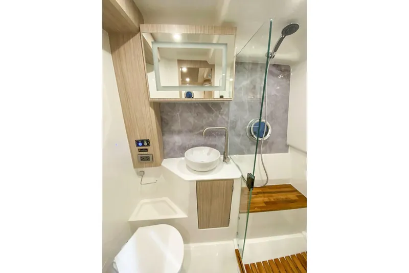 Slide: The Image of Modern bathroom in Hanover 387, 2027 model, featuring sleek fixtures and wooden accents. - 5