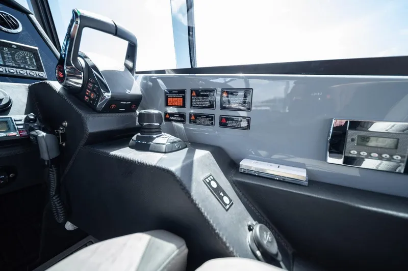 Slide: The Image of Cockpit of 2027 Hanover 387 boat with modern controls and displays. - 6