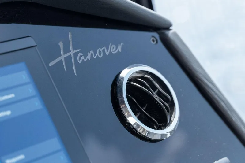 Slide: The Image of Dashboard of 2027 Hanover 387 featuring sleek air vent and digital display. - 7