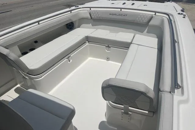 Slide: The Image of 2025 World Cat 280 CC-X boat interior with spacious white seating and modern design. - 3