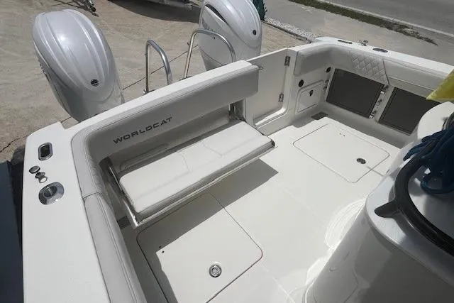 Slide: The Image of 2025 World Cat 280 CC-X boat interior with seating and dual engines. - 6