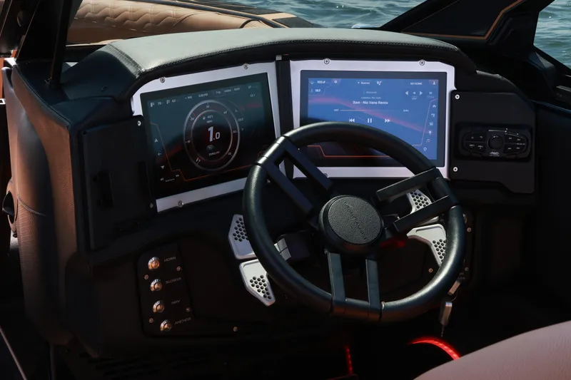 Slide: The Image of 2024 Centurion Ri265 dashboard with dual screens and modern steering wheel. - 14