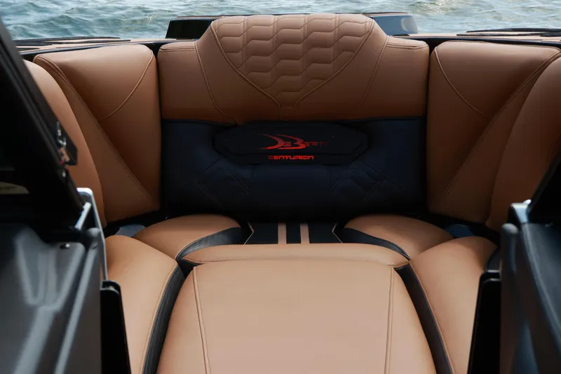 Slide: The Image of 2024 Centurion Ri265 boat interior with luxurious tan leather seating. - 15