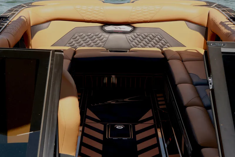 Slide: The Image of 2024 Centurion Ri265 boat interior with luxurious leather seating and modern design. - 18