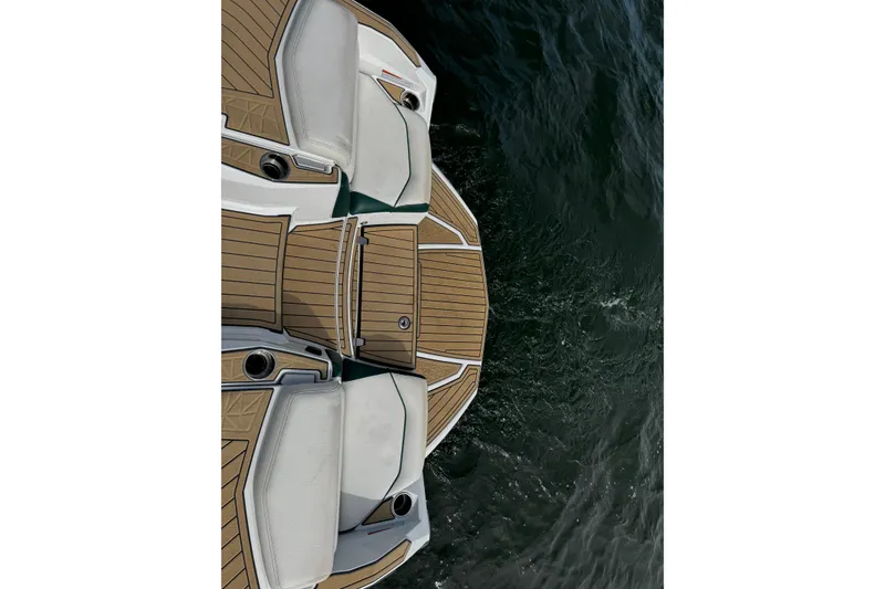 Slide: The Image of 2020 Nautique Super Air Nautique G23 Paragon boat deck on water. - 10