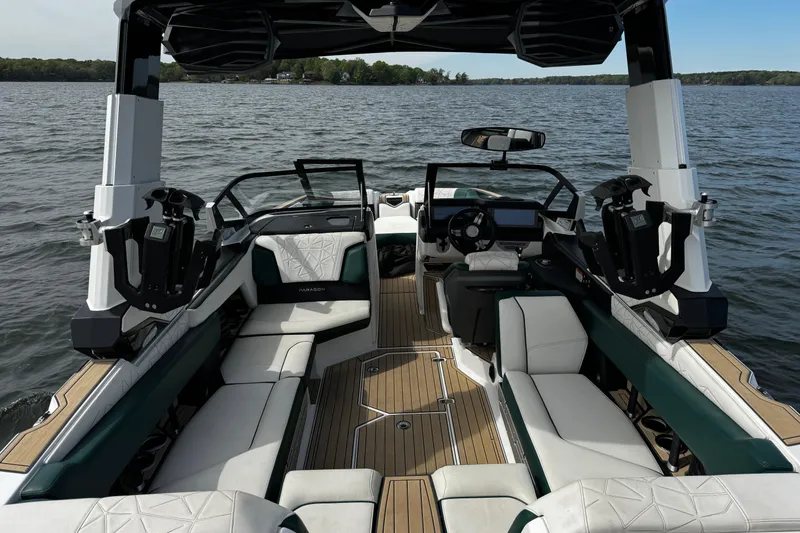 Slide: The Image of 2020 Nautique Super Air Nautique G23 Paragon interior on a serene lake. - 11