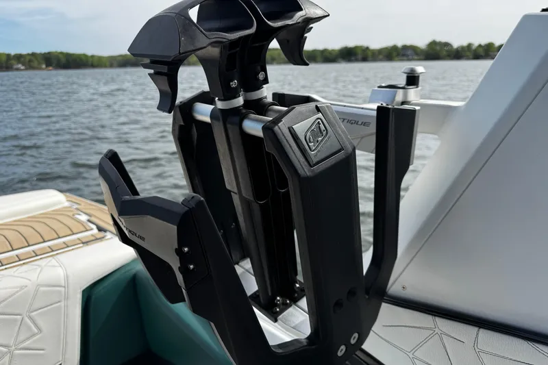 Slide: The Image of 2020 Nautique Super Air Nautique G23 Paragon wakeboard rack on a lake. - 15
