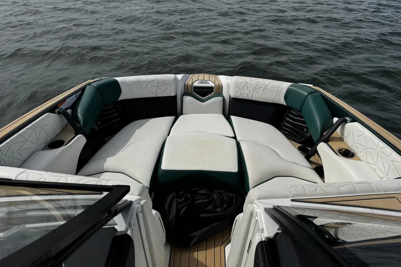 Slide: The Image of Luxurious interior of 2020 Nautique Super Air Nautique G23 Paragon boat on water. - 19