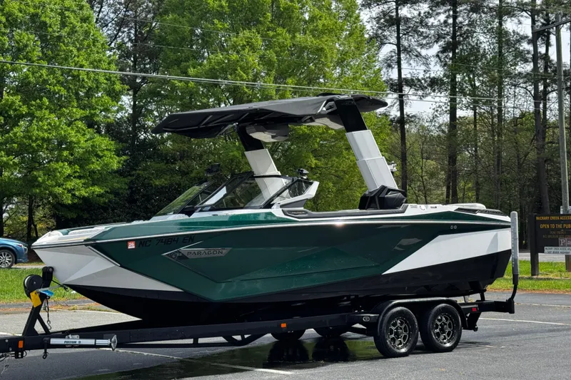 Slide: The Image of 2020 Nautique Super Air Nautique G23 Paragon boat on trailer, parked outdoors. - 9