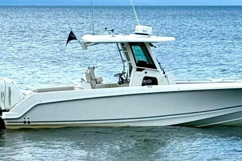 The Image of 2018 Boston Whaler 280 Outrage boat on calm sea waters. - 1