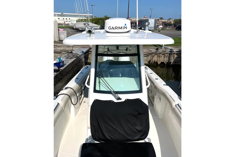 Slide: The Image of 2018 Boston Whaler 280 Outrage boat with Garmin equipment at dockside. - 34