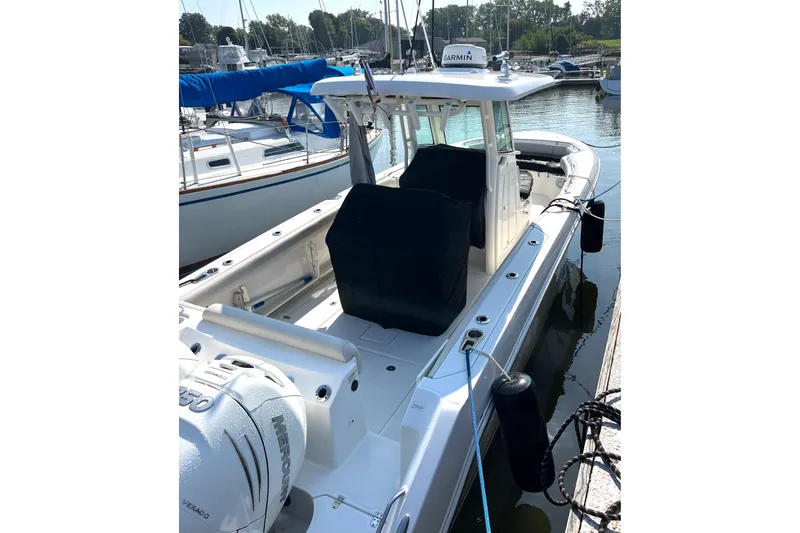 Slide: The Image of 2018 Boston Whaler 280 Outrage docked at marina. - 35