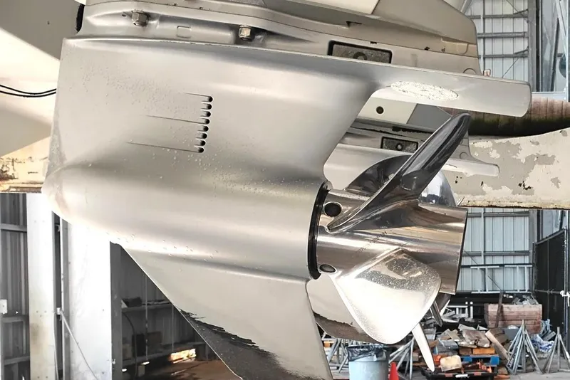 Slide: The Image of Close-up of a 2018 Boston Whaler 280 Outrage boat propeller in a workshop. - 37