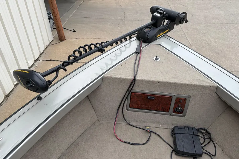 Slide: The Image of 2004 Bass Tracker Tournament V-18 boat with trolling motor and foot pedal control. - 10