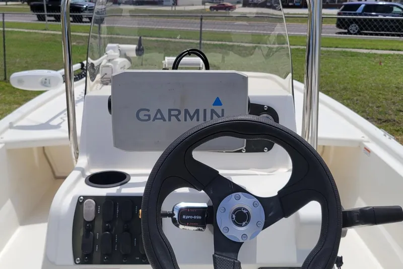 Slide: The Image of 2020 Mako Pro Skiff 19 CC boat dashboard with Garmin navigation system. - 8