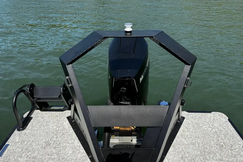 Slide: The Image of Boat with Revel RS25L motor, 2026 model, on water. - 8