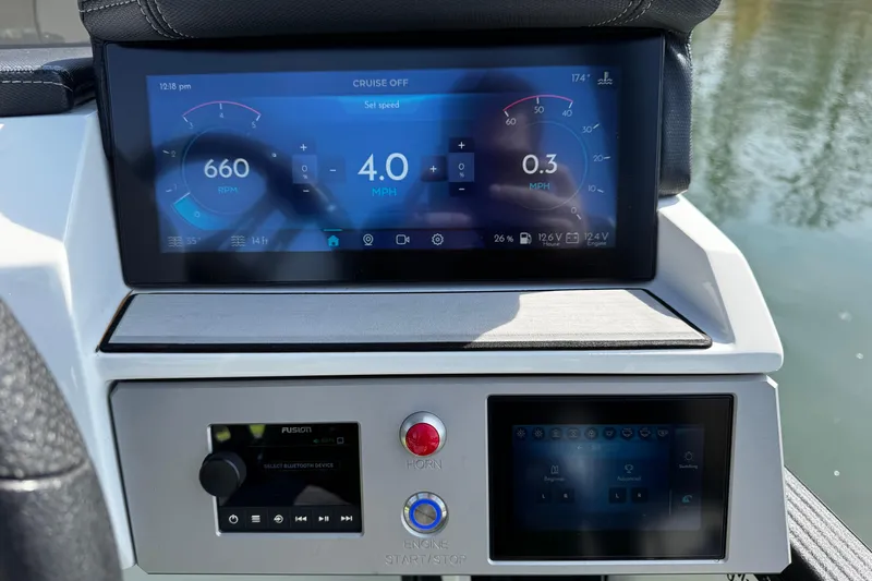 Slide: The Image of Dashboard of a 2021 Montara 25 boat displaying speed and RPM gauges. - 18