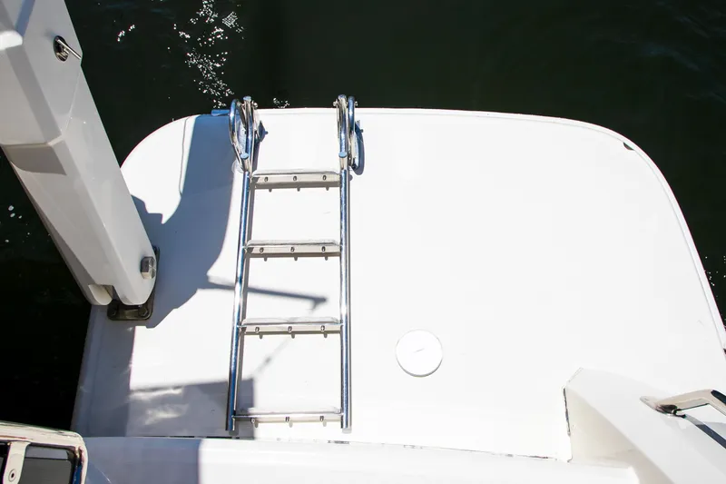 Slide: The Image of Aquila 44 Yacht 2017 swim platform with ladder. - 24