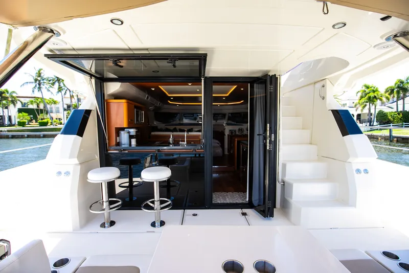 Slide: The Image of Luxurious interior of 2017 Aquila 44 Yacht with bar stools. - 33