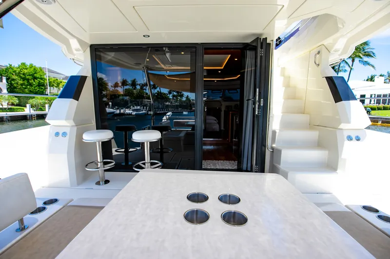 Slide: The Image of Aquila 44 Yacht 2017 featuring stylish interior and bar stools. - 40