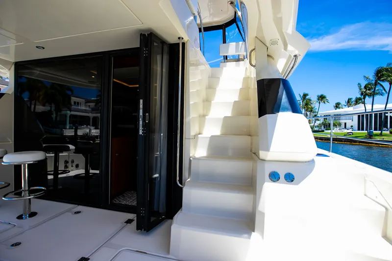 Slide: The Image of Aquila 44 Yacht 2017 with staircase and interior view. - 43