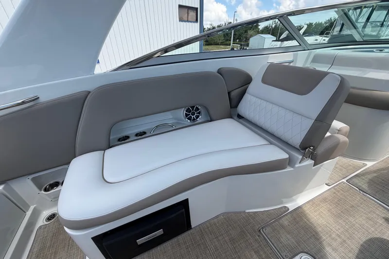 Slide: The Image of 2019 Crownline Eclipse E295 XS boat interior with luxurious seating and modern design. - 17